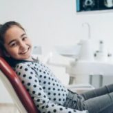 Little girl patient in the dentist's office